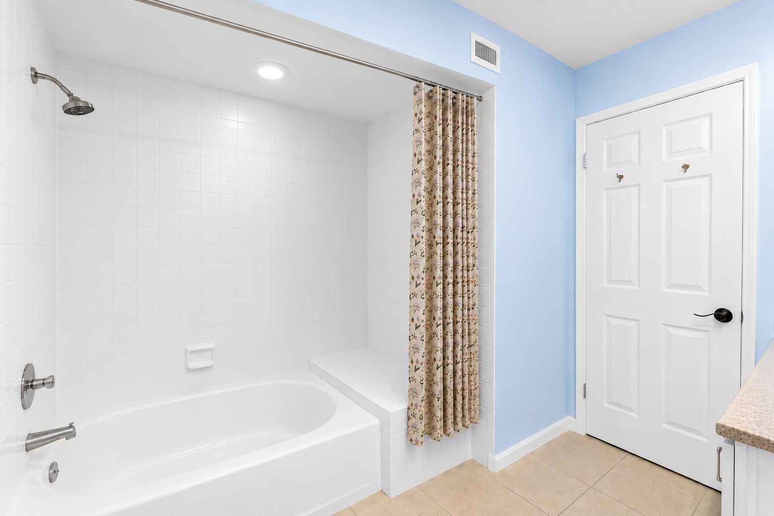 Low clearance bath and shower